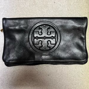 Black Tory Burch clutch in excellent condition with two zippers